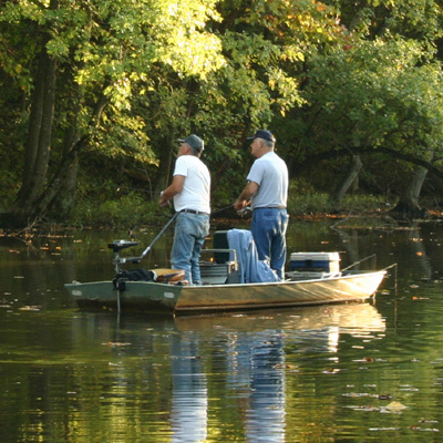 JON BOAT - Perfect for hunting, fishing, or trolling, this 15-foot Jon Boat includes a 15HP motor and trailer.